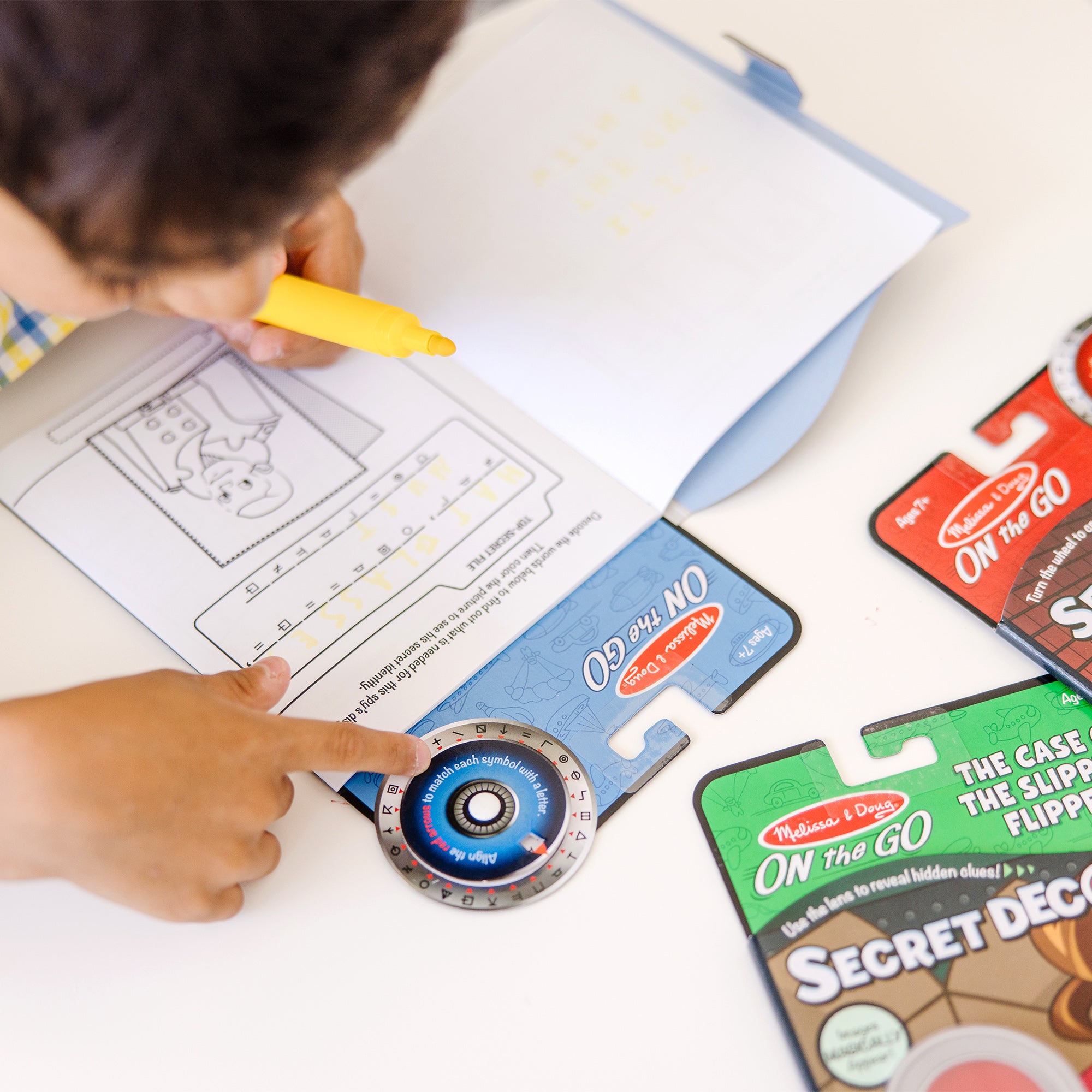 On the Go™ Secret Decoder Activity Books 3-Pack: Slippery Flippers. Runaway Ruby. Game Book - Image 7